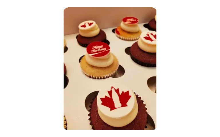 Custom branded cupcakes with Coke Canada logo